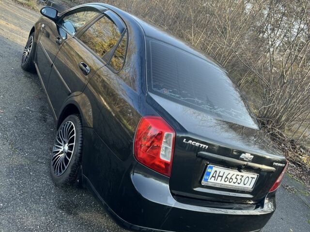 Черный Шевроле Лачетти, объемом двигателя 1.6 л и пробегом 150 тыс. км за 5300 $, фото 5 на Automoto.ua