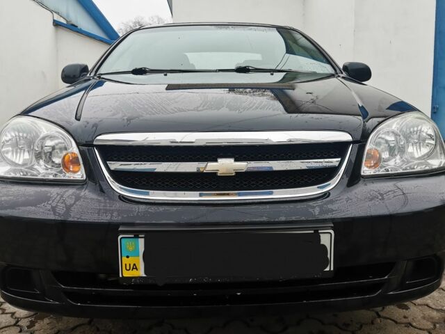 Черный Шевроле Лачетти, объемом двигателя 1.6 л и пробегом 185 тыс. км за 5300 $, фото 14 на Automoto.ua