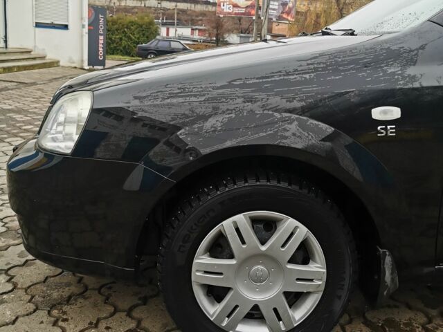 Черный Шевроле Лачетти, объемом двигателя 1.6 л и пробегом 185 тыс. км за 5300 $, фото 20 на Automoto.ua