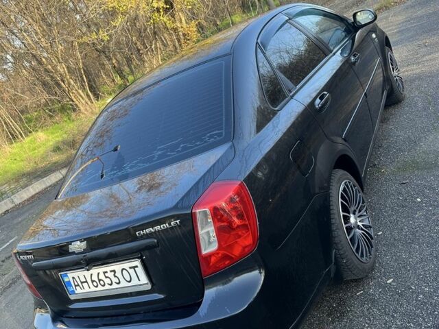 Черный Шевроле Лачетти, объемом двигателя 1.6 л и пробегом 150 тыс. км за 5300 $, фото 3 на Automoto.ua