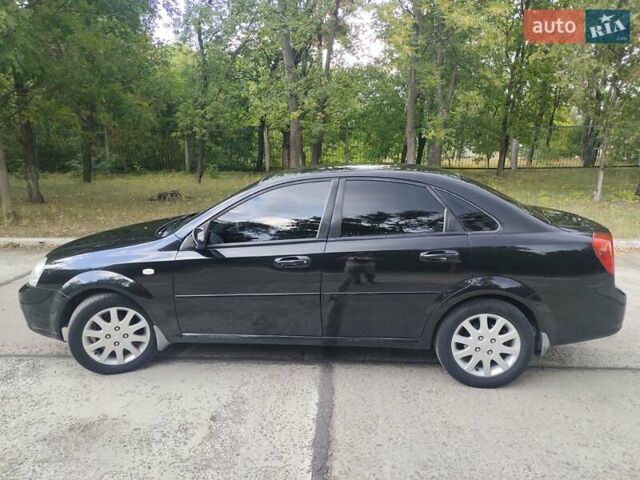 Черный Шевроле Лачетти, объемом двигателя 1.8 л и пробегом 265 тыс. км за 4600 $, фото 10 на Automoto.ua