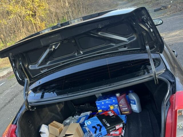 Черный Шевроле Лачетти, объемом двигателя 1.6 л и пробегом 150 тыс. км за 5300 $, фото 19 на Automoto.ua