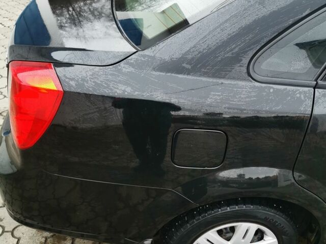 Черный Шевроле Лачетти, объемом двигателя 1.6 л и пробегом 185 тыс. км за 5300 $, фото 9 на Automoto.ua