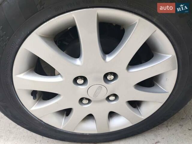 Черный Шевроле Лачетти, объемом двигателя 1.8 л и пробегом 265 тыс. км за 4600 $, фото 12 на Automoto.ua