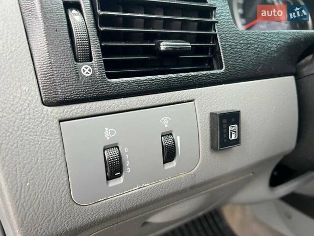 Черный Шевроле Лачетти, объемом двигателя 1.6 л и пробегом 247 тыс. км за 3890 $, фото 18 на Automoto.ua