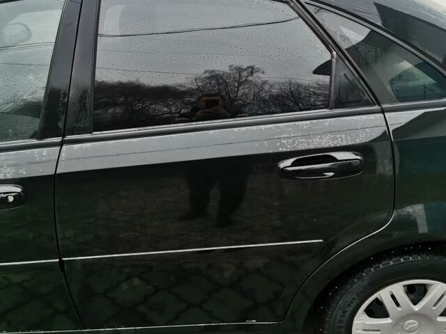 Черный Шевроле Лачетти, объемом двигателя 1.6 л и пробегом 185 тыс. км за 5300 $, фото 17 на Automoto.ua