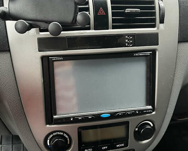 Черный Шевроле Лачетти, объемом двигателя 1.8 л и пробегом 176 тыс. км за 4550 $, фото 10 на Automoto.ua