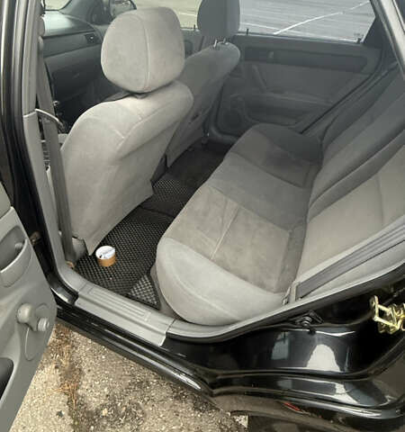 Чорний Шевроле Лачетті, об'ємом двигуна 1.6 л та пробігом 166 тис. км за 4900 $, фото 15 на Automoto.ua