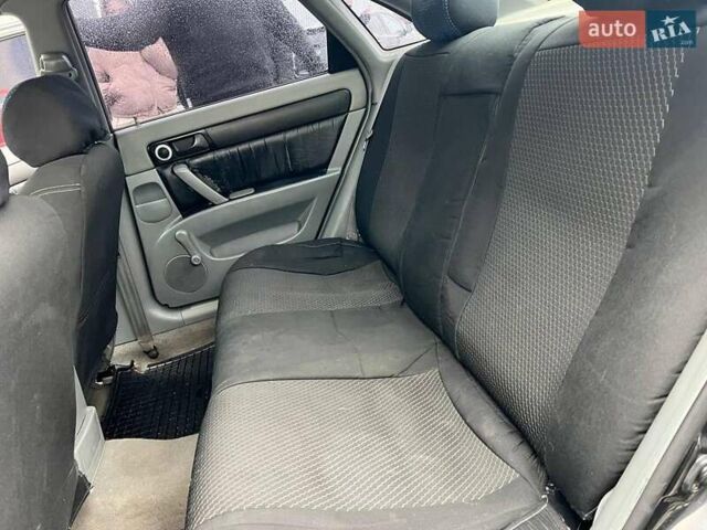 Черный Шевроле Лачетти, объемом двигателя 1.6 л и пробегом 247 тыс. км за 3890 $, фото 30 на Automoto.ua