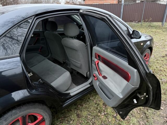 Черный Шевроле Лачетти, объемом двигателя 1.8 л и пробегом 213 тыс. км за 3750 $, фото 6 на Automoto.ua