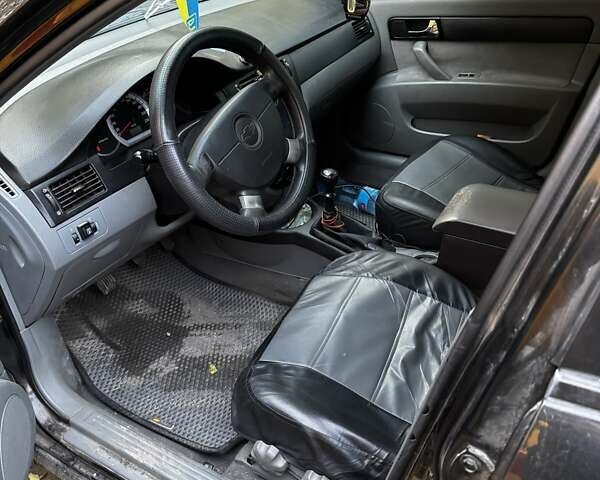 Чорний Шевроле Лачетті, об'ємом двигуна 1.6 л та пробігом 270 тис. км за 3500 $, фото 13 на Automoto.ua