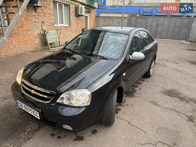 Черный Шевроле Лачетти, объемом двигателя 1.8 л и пробегом 220 тыс. км за 2999 $, фото 9 на Automoto.ua