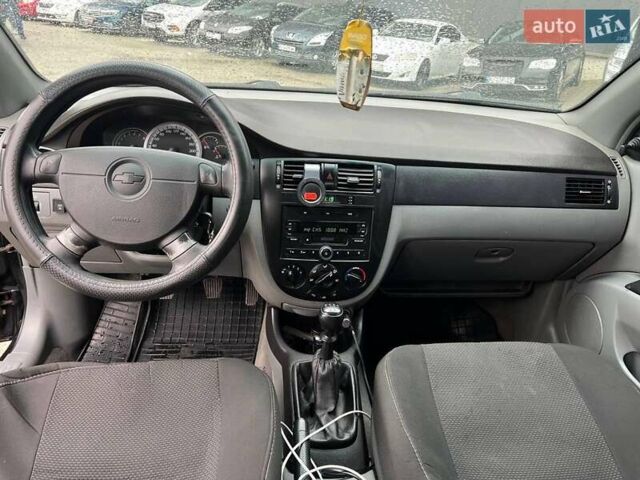 Черный Шевроле Лачетти, объемом двигателя 1.6 л и пробегом 247 тыс. км за 3890 $, фото 31 на Automoto.ua