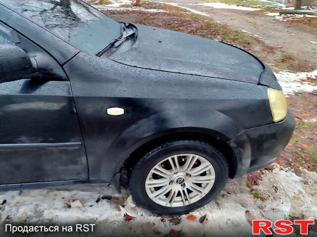 Черный Шевроле Лачетти, объемом двигателя 1.6 л и пробегом 200 тыс. км за 2800 $, фото 1 на Automoto.ua