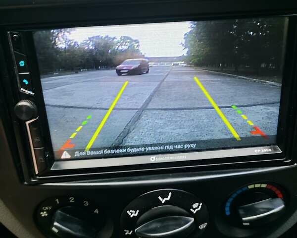 Черный Шевроле Лачетти, объемом двигателя 1.8 л и пробегом 265 тыс. км за 4600 $, фото 38 на Automoto.ua