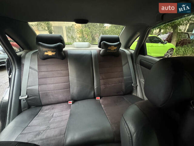 Черный Шевроле Лачетти, объемом двигателя 1.6 л и пробегом 252 тыс. км за 5700 $, фото 6 на Automoto.ua