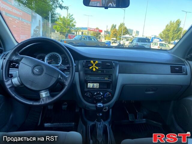 Черный Шевроле Лачетти, объемом двигателя 1.8 л и пробегом 293 тыс. км за 4200 $, фото 6 на Automoto.ua