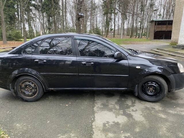 Черный Шевроле Лачетти, объемом двигателя 1.6 л и пробегом 264 тыс. км за 1999 $, фото 14 на Automoto.ua