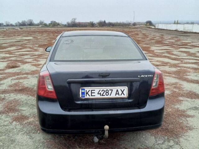 Черный Шевроле Лачетти, объемом двигателя 1.6 л и пробегом 233 тыс. км за 3650 $, фото 2 на Automoto.ua