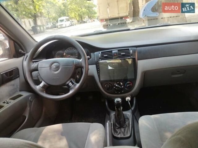 Черный Шевроле Лачетти, объемом двигателя 1.6 л и пробегом 400 тыс. км за 4000 $, фото 1 на Automoto.ua