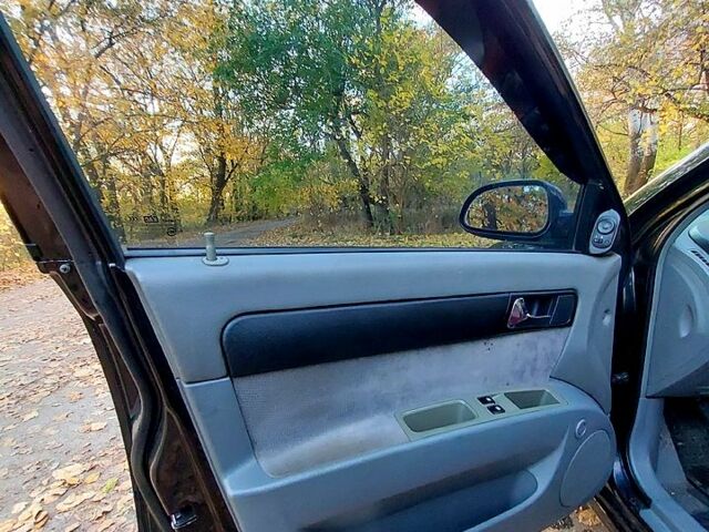 Черный Шевроле Лачетти, объемом двигателя 1.8 л и пробегом 250 тыс. км за 4700 $, фото 11 на Automoto.ua