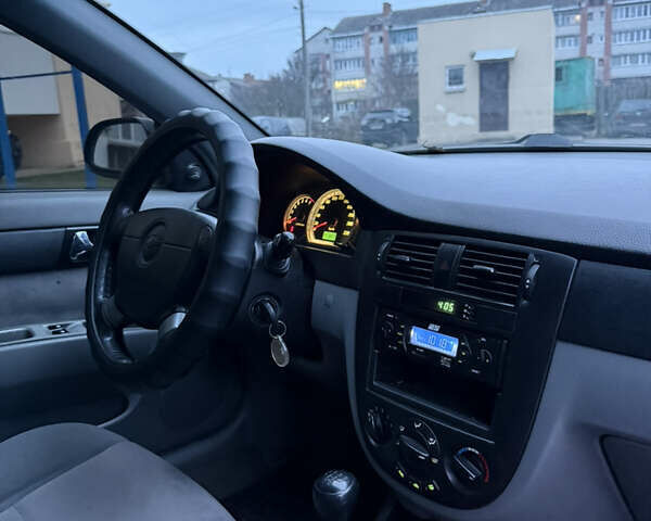 Черный Шевроле Лачетти, объемом двигателя 1.6 л и пробегом 233 тыс. км за 3750 $, фото 18 на Automoto.ua
