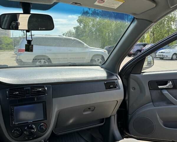 Черный Шевроле Лачетти, объемом двигателя 1.8 л и пробегом 194 тыс. км за 3700 $, фото 8 на Automoto.ua