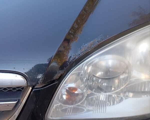 Черный Шевроле Лачетти, объемом двигателя 1.8 л и пробегом 282 тыс. км за 3500 $, фото 19 на Automoto.ua