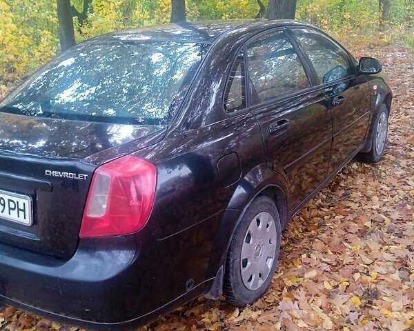 Чорний Шевроле Лачетті, об'ємом двигуна 1.8 л та пробігом 300 тис. км за 3500 $, фото 8 на Automoto.ua