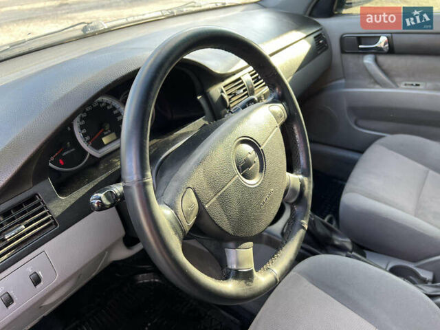 Чорний Шевроле Лачетті, об'ємом двигуна 1.8 л та пробігом 240 тис. км за 3500 $, фото 12 на Automoto.ua