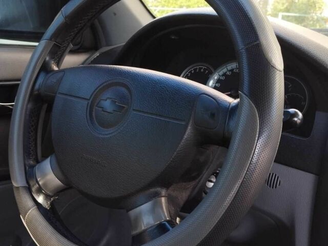 Черный Шевроле Лачетти, объемом двигателя 1.8 л и пробегом 367 тыс. км за 3500 $, фото 2 на Automoto.ua