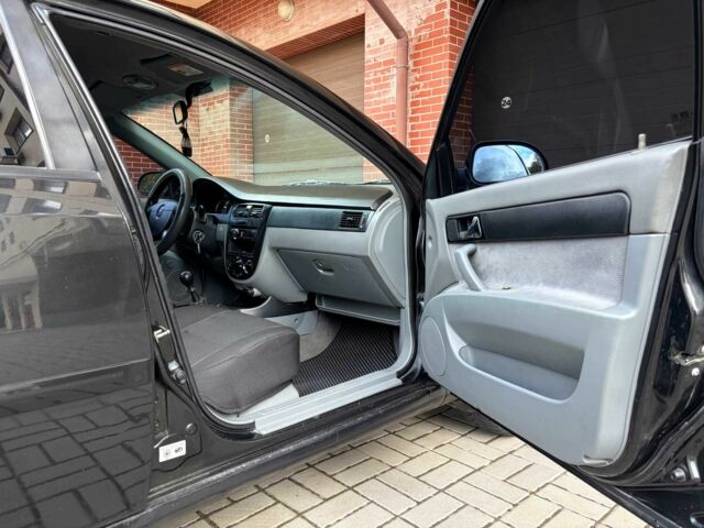 Черный Шевроле Лачетти, объемом двигателя 1.8 л и пробегом 204 тыс. км за 4300 $, фото 16 на Automoto.ua