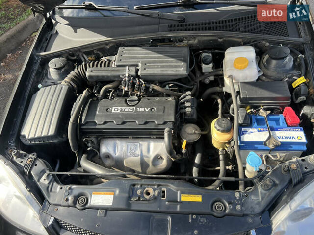 Черный Шевроле Лачетти, объемом двигателя 1.8 л и пробегом 248 тыс. км за 4250 $, фото 24 на Automoto.ua