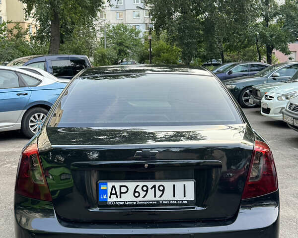Черный Шевроле Лачетти, объемом двигателя 1.6 л и пробегом 252 тыс. км за 5700 $, фото 14 на Automoto.ua