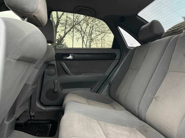 Чорний Шевроле Лачетті, об'ємом двигуна 1.8 л та пробігом 237 тис. км за 3600 $, фото 17 на Automoto.ua