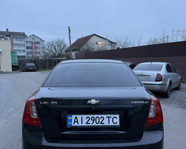 Черный Шевроле Лачетти, объемом двигателя 1.6 л и пробегом 233 тыс. км за 3750 $, фото 6 на Automoto.ua