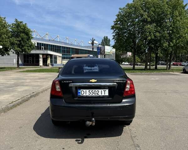 Черный Шевроле Лачетти, объемом двигателя 1.8 л и пробегом 194 тыс. км за 3700 $, фото 6 на Automoto.ua