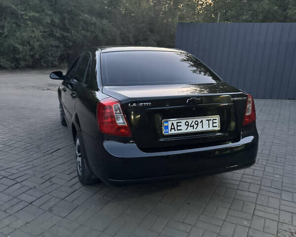 Черный Шевроле Лачетти, объемом двигателя 1.6 л и пробегом 195 тыс. км за 4850 $, фото 2 на Automoto.ua