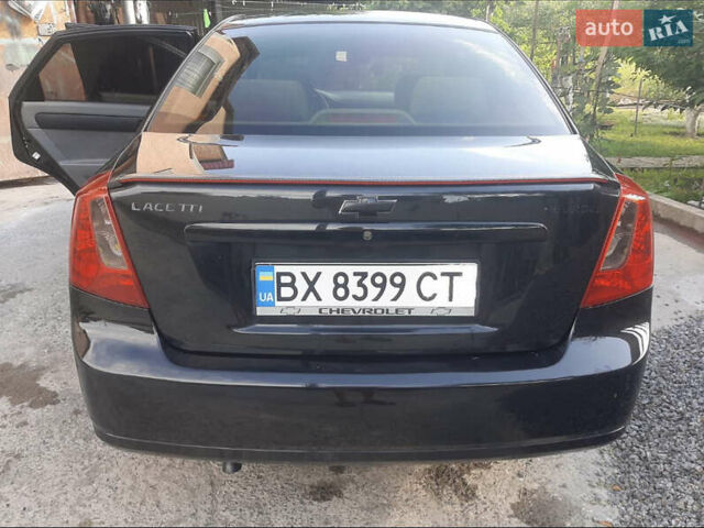 Черный Шевроле Лачетти, объемом двигателя 1.6 л и пробегом 215 тыс. км за 4000 $, фото 1 на Automoto.ua