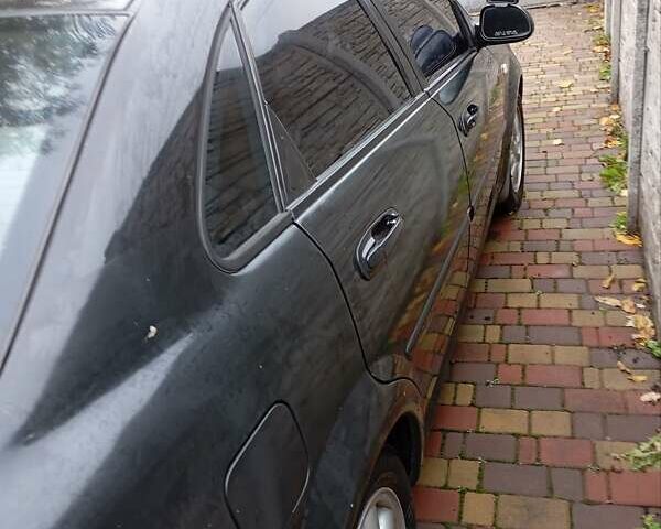 Черный Шевроле Лачетти, объемом двигателя 1.8 л и пробегом 282 тыс. км за 3500 $, фото 8 на Automoto.ua