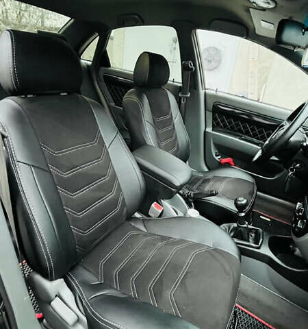 Черный Шевроле Лачетти, объемом двигателя 1.6 л и пробегом 218 тыс. км за 4800 $, фото 23 на Automoto.ua