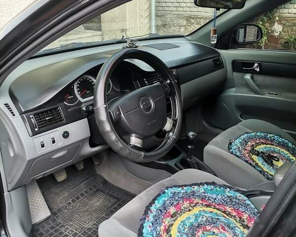 Черный Шевроле Лачетти, объемом двигателя 1.8 л и пробегом 270 тыс. км за 4600 $, фото 5 на Automoto.ua