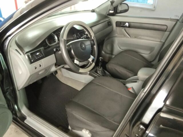 Черный Шевроле Лачетти, объемом двигателя 1.8 л и пробегом 204 тыс. км за 4450 $, фото 3 на Automoto.ua