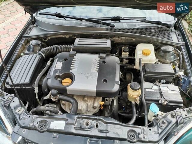 Черный Шевроле Лачетти, объемом двигателя 1.8 л и пробегом 270 тыс. км за 4600 $, фото 12 на Automoto.ua