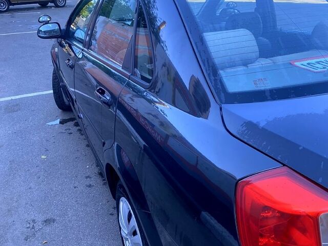 Черный Шевроле Лачетти, объемом двигателя 1.8 л и пробегом 293 тыс. км за 4200 $, фото 5 на Automoto.ua