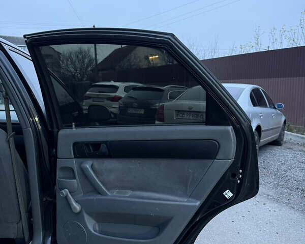 Черный Шевроле Лачетти, объемом двигателя 1.6 л и пробегом 233 тыс. км за 3750 $, фото 27 на Automoto.ua