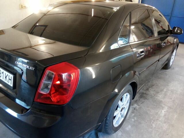 Черный Шевроле Лачетти, объемом двигателя 1.8 л и пробегом 204 тыс. км за 4450 $, фото 2 на Automoto.ua