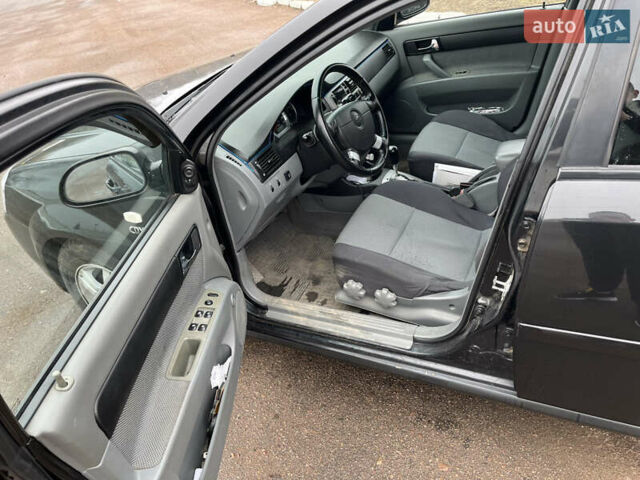 Чорний Шевроле Лачетті, об'ємом двигуна 1.8 л та пробігом 315 тис. км за 4550 $, фото 10 на Automoto.ua