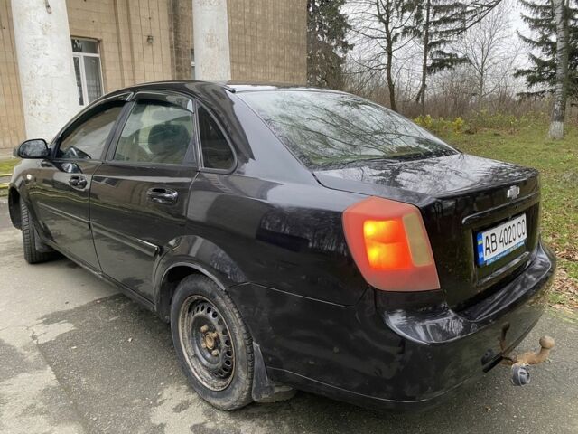 Черный Шевроле Лачетти, объемом двигателя 1.6 л и пробегом 264 тыс. км за 1999 $, фото 15 на Automoto.ua