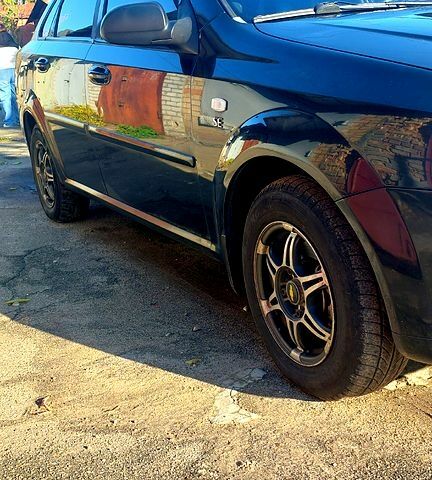 Чорний Шевроле Лачетті, об'ємом двигуна 1.6 л та пробігом 242 тис. км за 4600 $, фото 4 на Automoto.ua